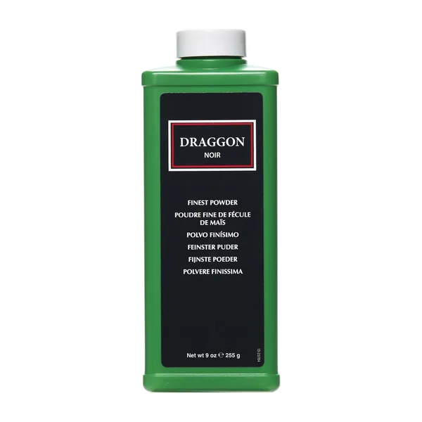 A green bottle of Clubman Draggon Noir powder